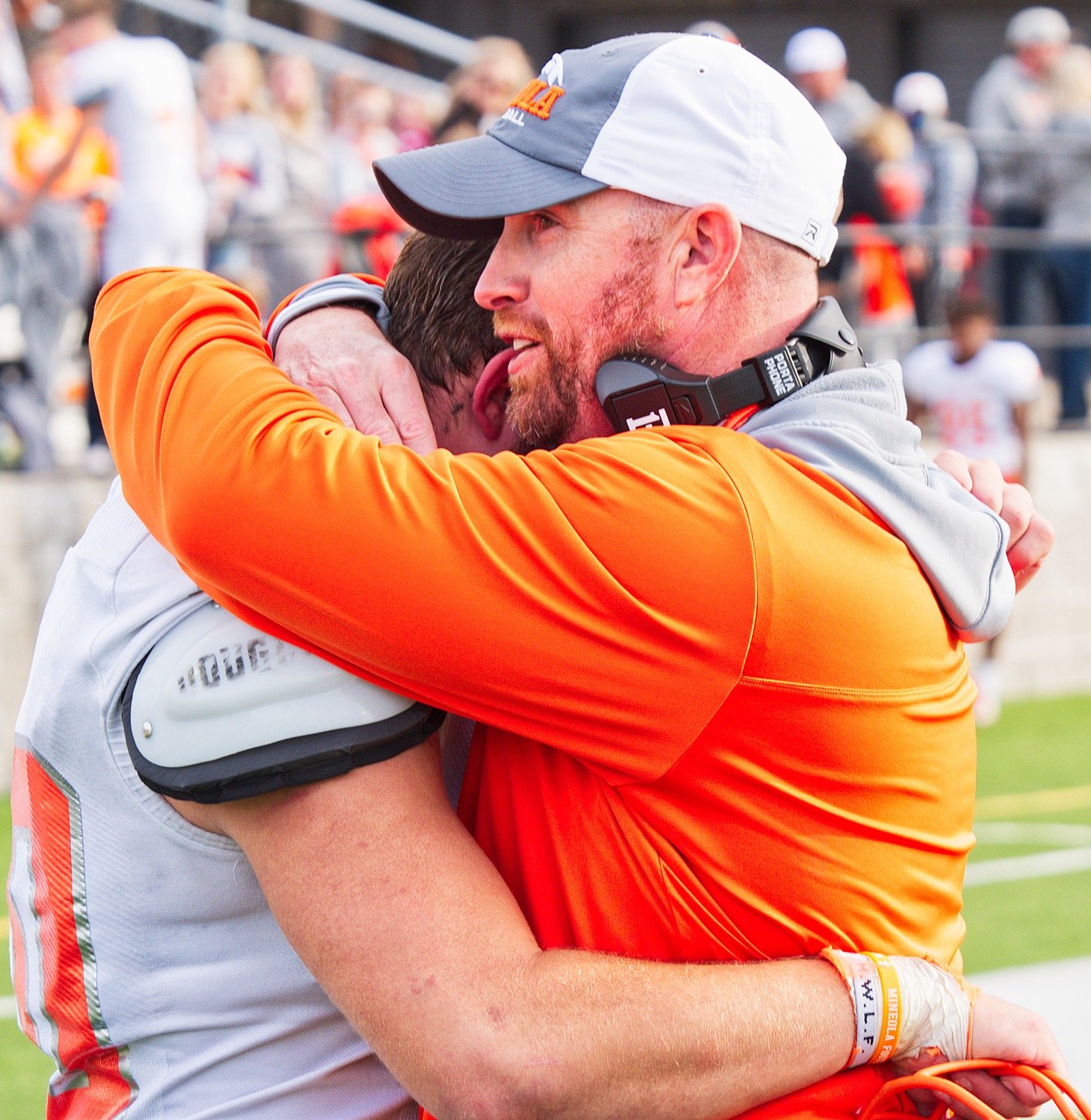 Coach Luke Blackwell hugs senior Hunter Wright and briefly grins as he talks to the linebacker and tight end after his last game as a Yellowjacket.
[see other moments or get a keepsake of these]